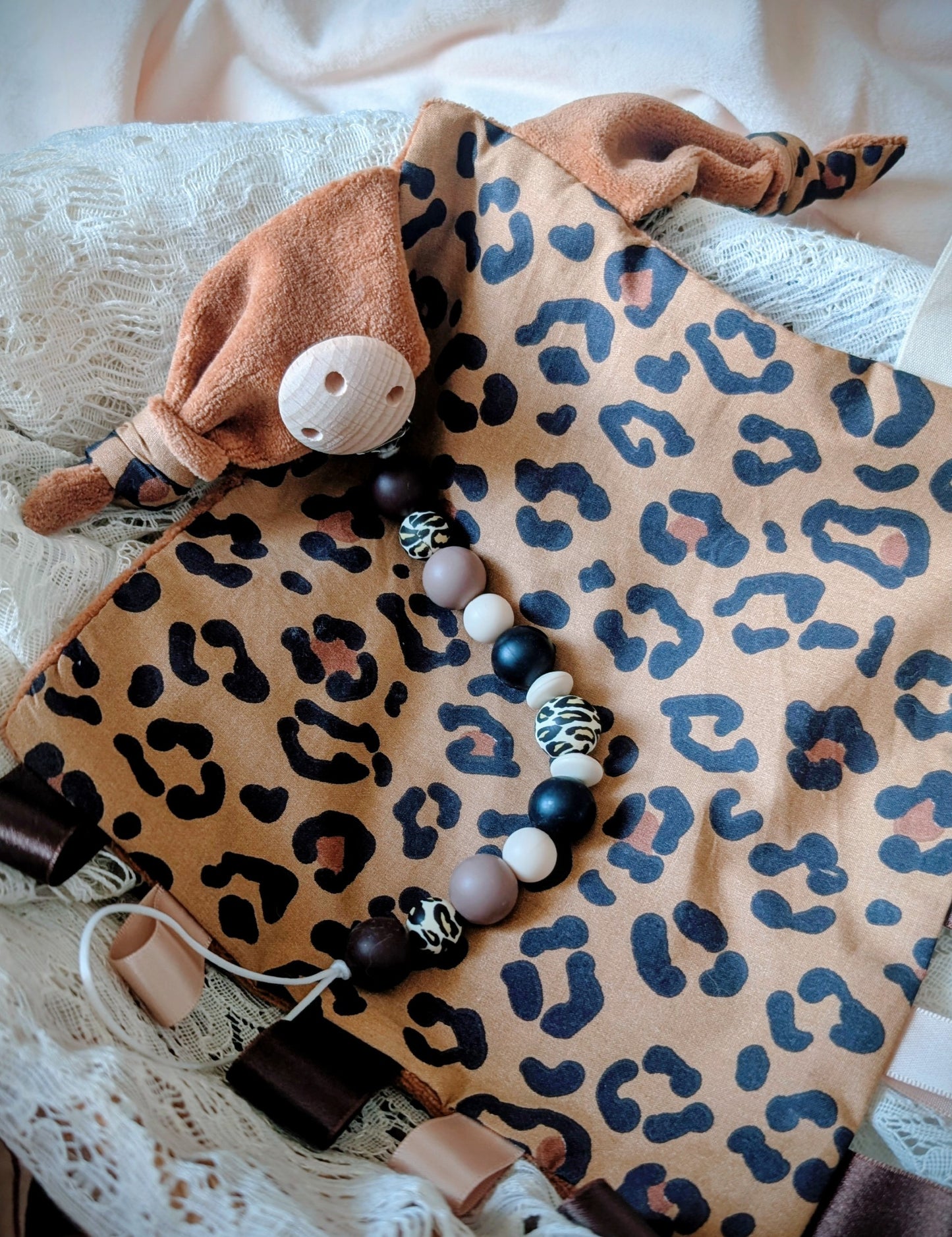Le doudou sensoriel Léopard